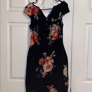 Black fitted off shoulder mini dress